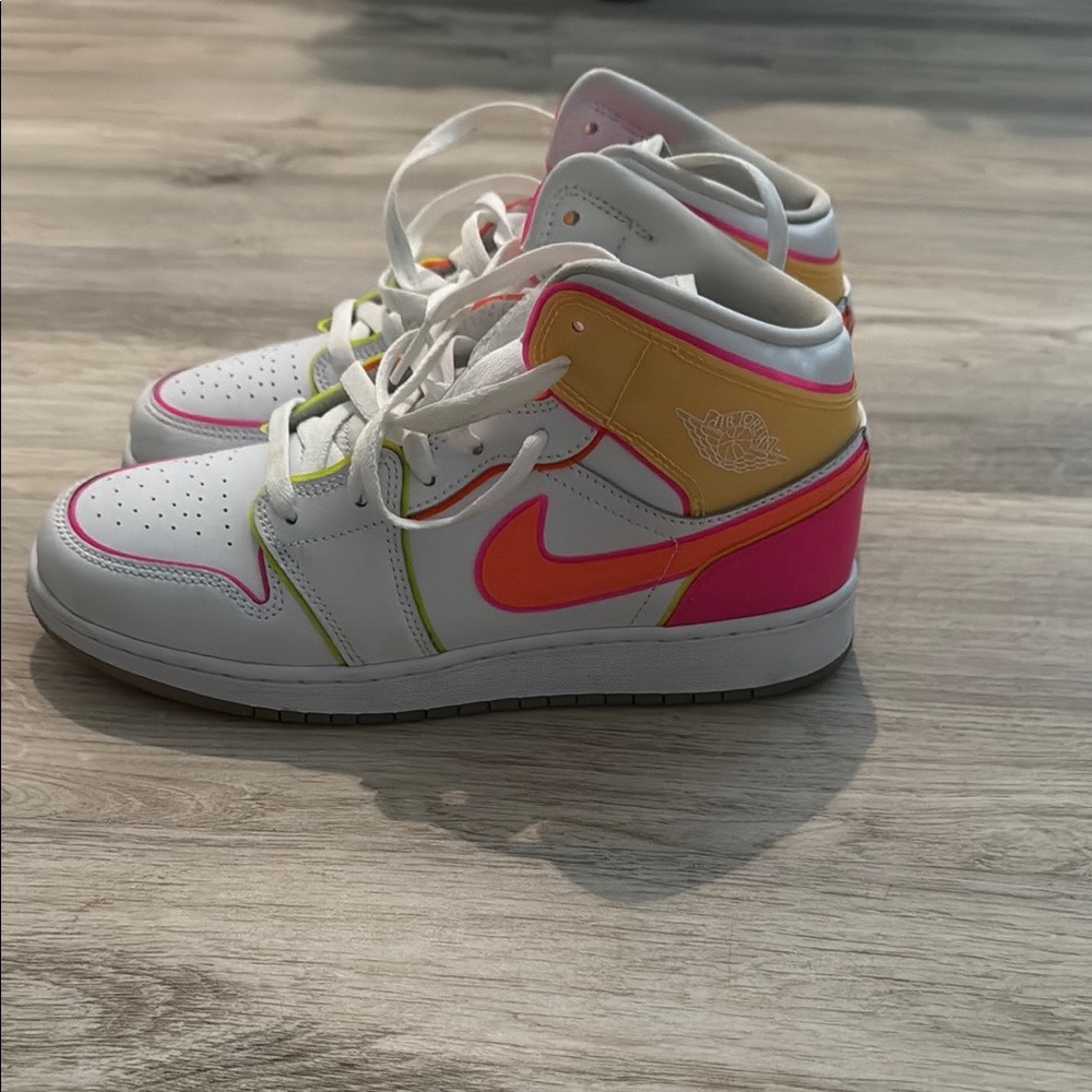 White and Pink Jordan 1 Mid Sneakers